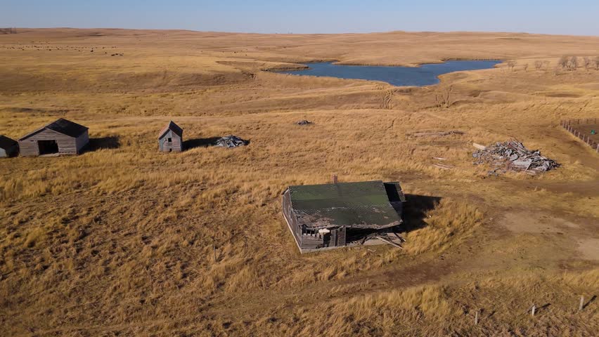 Drone circling old farmstead on the South Dakota prairie