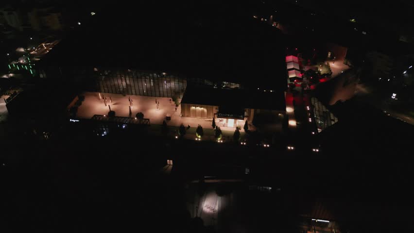 spinning aerial of college town of Lasi, Romania at night