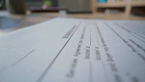Closeup document on office desk at organized workspace. Legal business contract lying on wooden desk professional work environment. Modern empty workplace for handling official paperwork dolly shot. - Powered by Shutterstock - Get 15% off with code: PIKWIZARD15