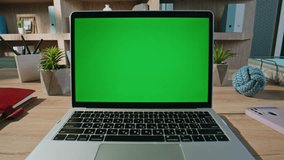 Freelancer touching mockup laptop touchpad browsing online app at home office closeup zoom in. Unknown businesswoman using trackpad green screen computer for office work. Professional technology. - Powered by Shutterstock - Get 15% off with code: PIKWIZARD15