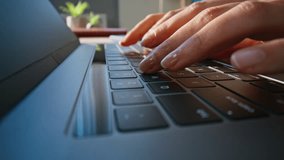 Macro shot fingers typing laptop in office environment. Unknown businesswoman hands pressing keys modern computer closeup dolly shot. Professional female freelancer working remotely at home workplace. - Powered by Shutterstock - Get 15% off with code: PIKWIZARD15