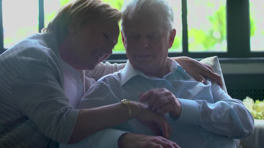 A touching moment between a caregiver and an elderly man, showcasing compassion and connection beyond words