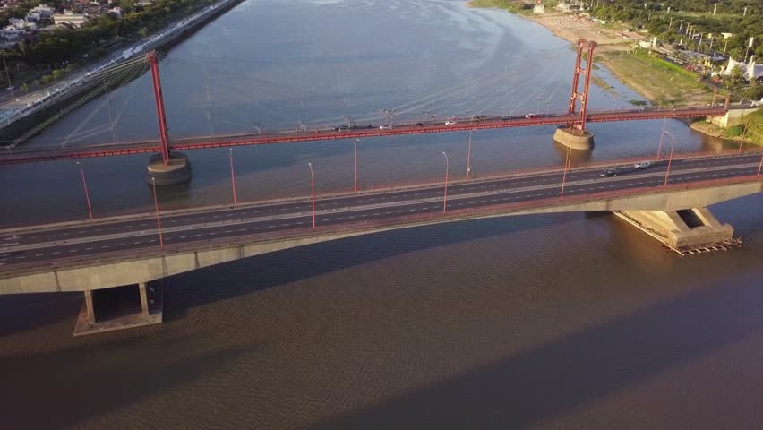 Aerial View of Santa Fe City Bridges Carretero and Colgante with Traffic Above River, Argentina