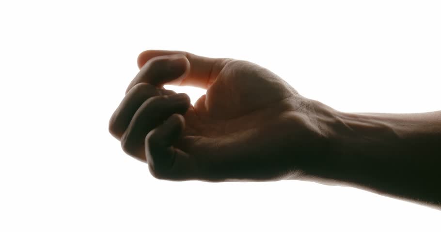 Close-up video showing smooth hand movements: fist rotation, finger bending and unbending on a white background in contrasting lighting.