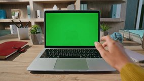 Office professional browsing greenscreen laptop at workspace closeup. Woman hands pressing key on green screen computer in modern workplace. Student turning on educational video at mockup device home. - Powered by Shutterstock - Get 15% off with code: PIKWIZARD15