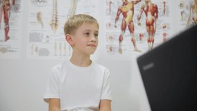 A boy visiting a doctor, a pediatrician - Powered by Shutterstock - Get 15% off with code: PIKWIZARD15