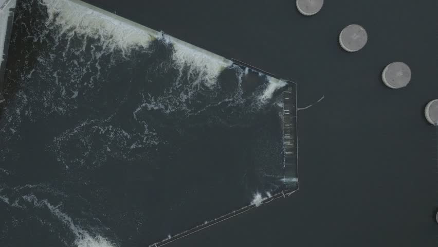 Top shot of Upper and lower dam under Central Avenue bridge on Mississippi river in Minneapolis, USA. Drone view.