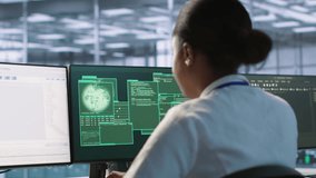 Woman seeing critical error on PC screen in data center, requesting help from cybersecurity team. Employee seeing security incidents affecting server room network system, camera A - Powered by Shutterstock - Get 15% off with code: PIKWIZARD15