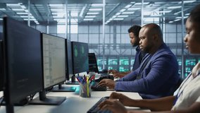 Happy data center employee pleased after successfully installing cybersecurity framework, seeing confirmation after reducing security incidents and enhancing data protection protocols, camera A - Powered by Shutterstock - Get 15% off with code: PIKWIZARD15