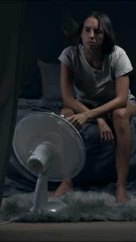 Woman suffering from heat during the heatwave