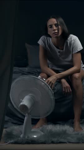 Woman suffering from heat during the heatwave