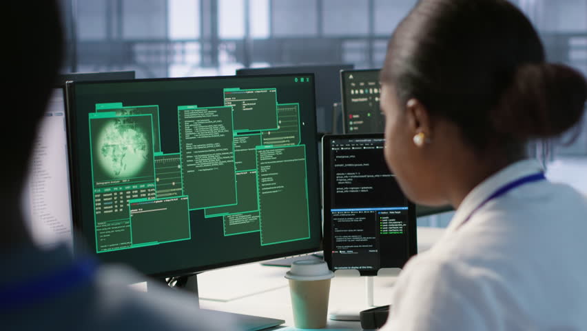 Cybersecurity experts in server farm trying to protect equipment from hacker stealing data. Close up of data center IT professionals struggling to delete virus attacking company servers, camera A - Powered by Shutterstock - Get 15% off with code: PIKWIZARD15
