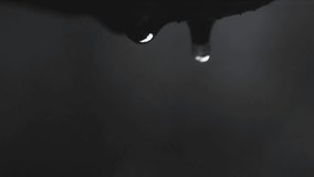 Slow-motion water droplets fall from rocky cliffs, each drop visible. In the background, a gentle waterfall flows, symbolizing water purity and scarcity. - Powered by Shutterstock - Get 15% off with code: PIKWIZARD15