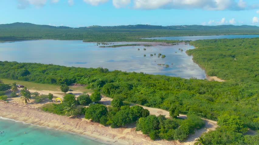 Panorama of Sun Bay Beach on sunny day, Puerto Rico. Aerial