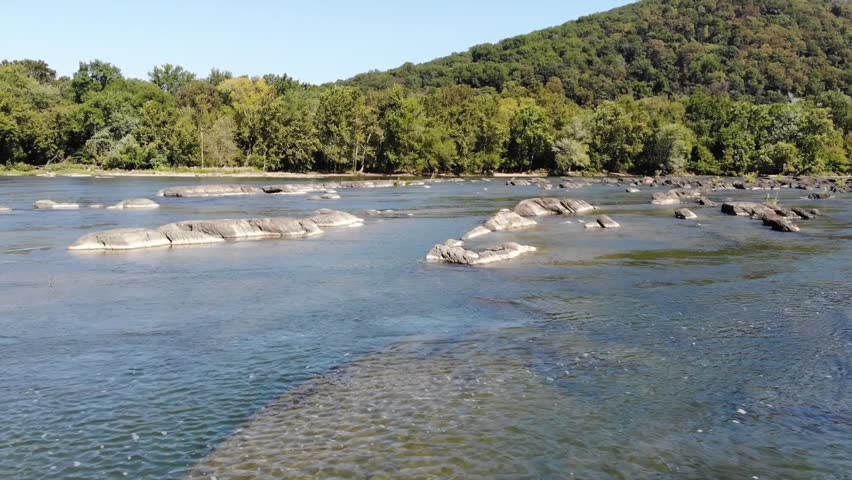 Potomac River in summer low aerial over rocks