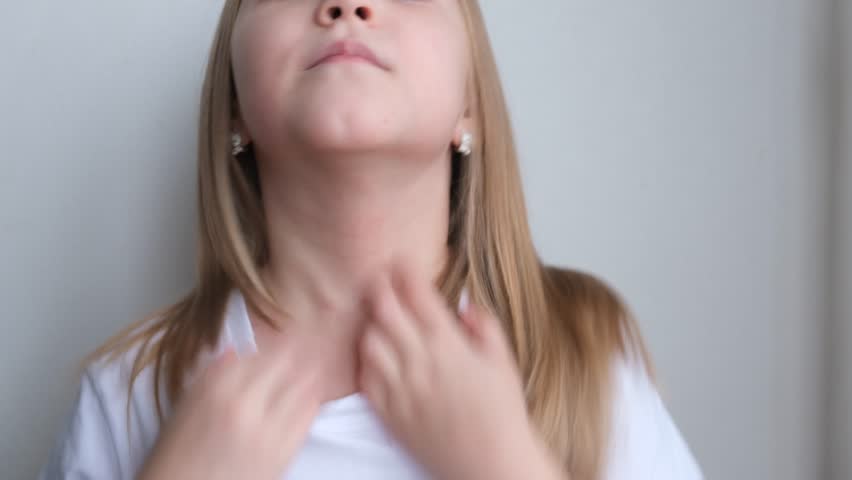 The child scratches atopic skin. Dermatitis, diathesis, allergy on the child's body.	
