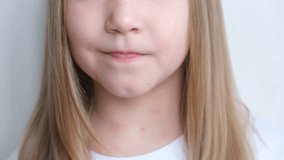 The children's dental plate is rainbow-colored. The child holds an orthodontic plate in his hands to align the teeth and expand the jaw. - Powered by Shutterstock - Get 15% off with code: PIKWIZARD15