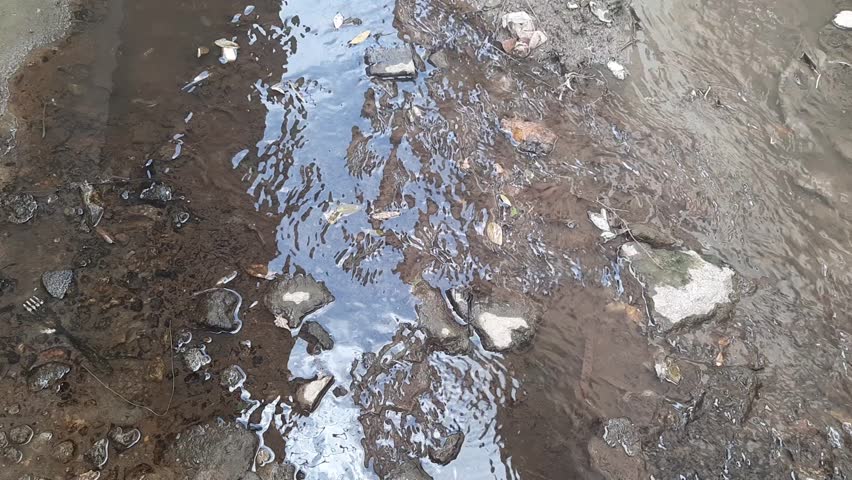 the water channel next to the house is no longer clogged