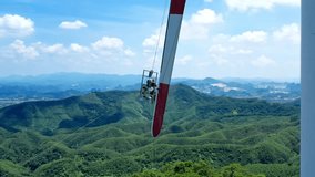Drone Shot of Wind Turbines Turning on a Mountain with a Sky Background. Concept of Environmental Conservation, Wind Power, Eco-Friendly, Save the Planet, Alternative Energy, Future Energy, Innovation - Powered by Shutterstock - Get 15% off with code: PIKWIZARD15