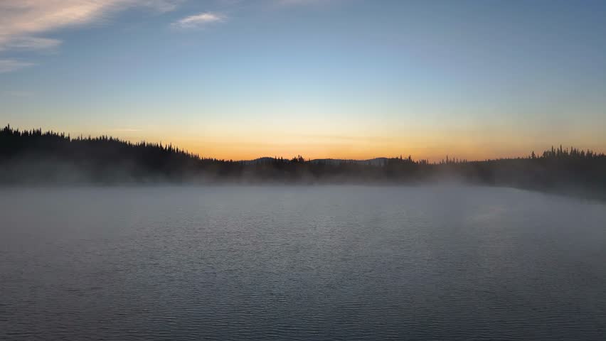 Moody morning on a lake in British Columbia, Canada.