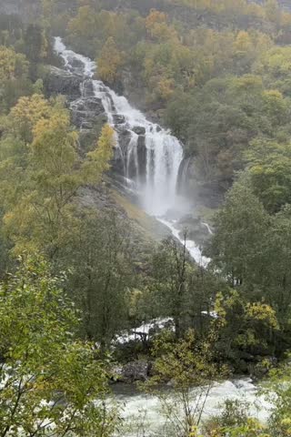 Beautiful cascade waterfalls in the mountains in Norway