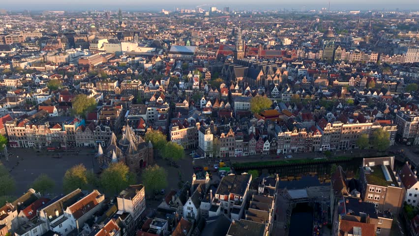 Amsterdam Historical Center Aerial morning View. Red light district and Old church in Amsterdam, the Netherlands.