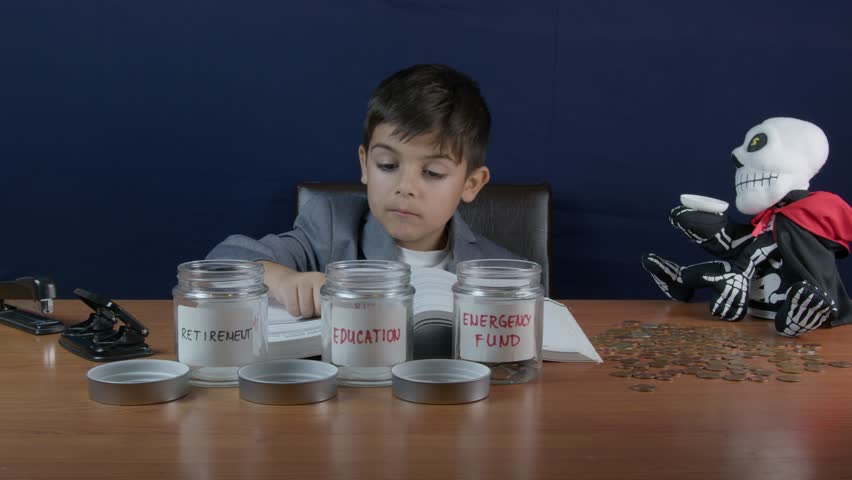 Idea concept. Financial education for kids. after studying child putys money in the jar for education. Personal growth investment. High quality 4k footage