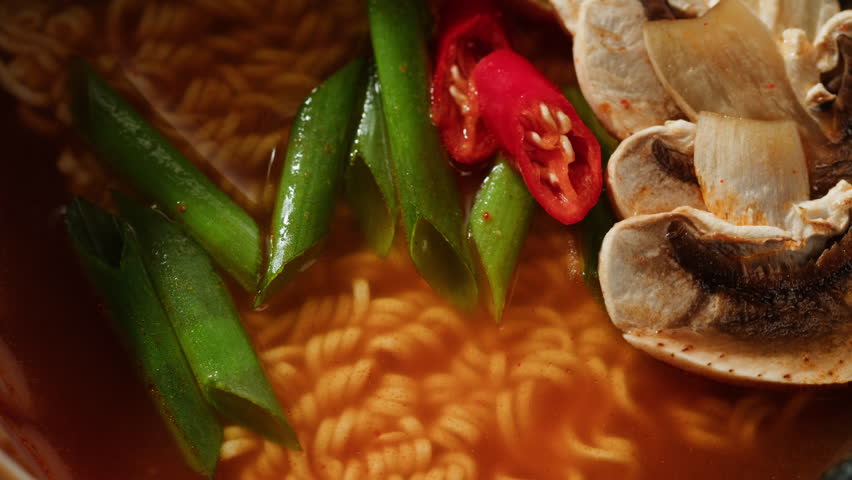 Japanese Ramen with Beef or chicken, rice noodles with fried meat, Tom Yam kung Spicy Thai asian soup, chef cooking in traditional korean chinese food. Close up of tasty korean cuisine. 