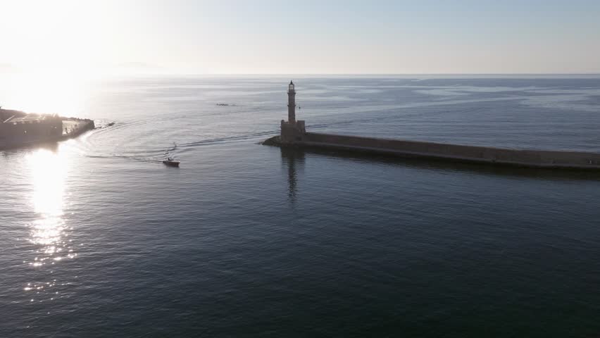Aerial view of Chania with the amazing lighthouse, Greece. Beautiful Old city, Greece and best scenic places - panorama of picturesque old town Chania. Crete island, Panoramic, Travel Concepts