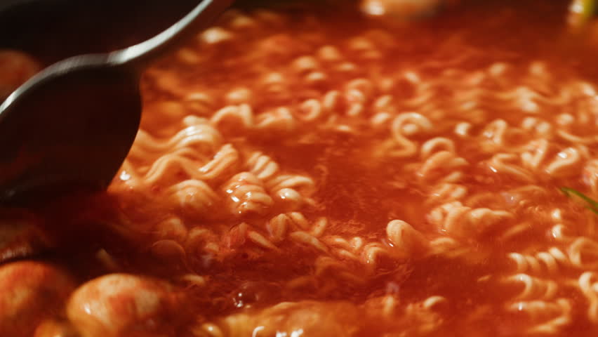 Japanese chinese hot pot noodles soup, Ramen with Beef or chicken, rice noodles with fried meat and mushrooms, Tom Yam kung Spicy Thai asian soup, chef cooking in traditional korean food. 