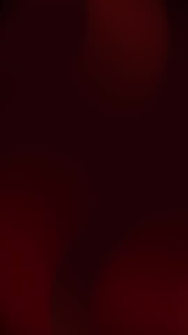 Vertical resolution dark red shades in blurred folds, perfect for abstract backgrounds, artistic projects, or trendy design elements with a modern aesthetic.