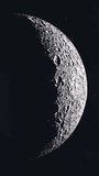 Vertical Shot of Zooming in to the Dark Side of the Moon as the Sun Slowly Reveals the Craters - Powered by Shutterstock - Get 15% off with code: PIKWIZARD15