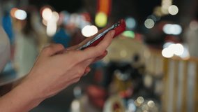 Woman hands type writing message on mobile phone spending time in night city closeup. Lady communicates online texting in chat via modern cellphone on evening town street - Powered by Shutterstock - Get 15% off with code: PIKWIZARD15