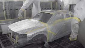 Robotic arms spray painting a vehicle body at a car manufacturing factory. Automobile factory. Car production. - Powered by Shutterstock - Get 15% off with code: PIKWIZARD15