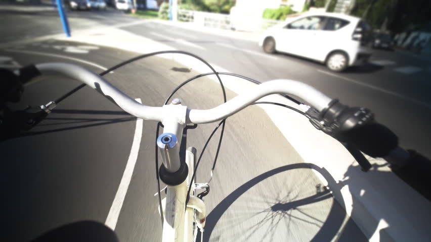 Person Entraina chooses an eco-responsible transport such as the city bike to get to work, to go for walks in the streets of the city of Montpellier located in France. High quality 4k footage