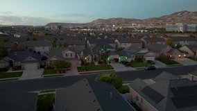 Suburban neighborhood with some houses decorated for Halloween - aerial parallax - Powered by Shutterstock - Get 15% off with code: PIKWIZARD15