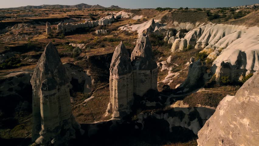 Aerial drone footage of the rugged landscape of Cappadocia, Turkey.