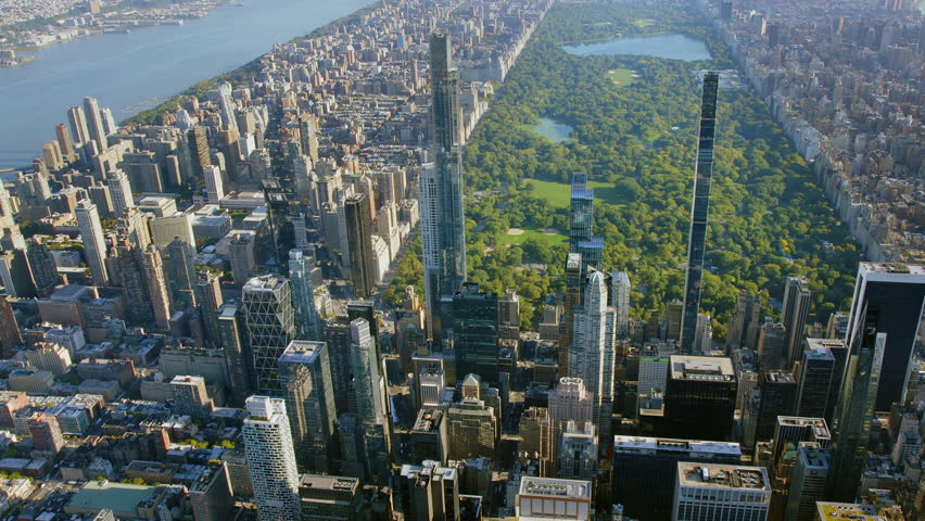 New York City, United States. October 6 2022. Amazing Aerial View of Billionaires Row in 57th and 59th street Midtown Manhattan. Supertall Skyscrapers. Central Park. Ponds and Lawns. 