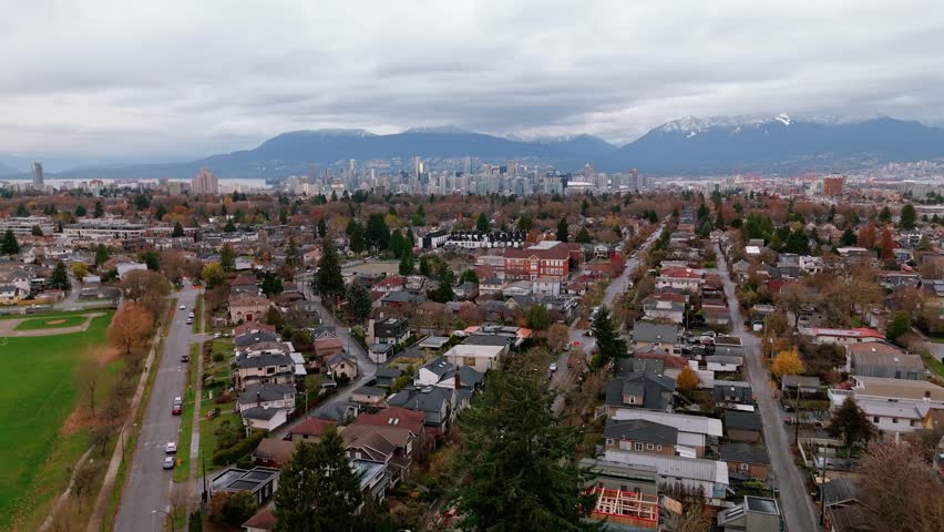 Drone captures vibrant city life in Vancouver from a breathtaking aerial perspective.