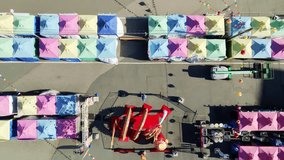 Colorful Tents, Vibrant Decorations, and a Large Dragon Figure Enhance the Festive Atmosphere of the Richmond Night Market Near YVR, British Columbia, Canada - Aerial Topdown Shot - Powered by Shutterstock - Get 15% off with code: PIKWIZARD15