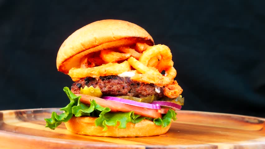 Ultimate Juicy Burger Delight
Savor the perfect bite with our ultimate juicy burger, featuring a tender patty, melted cheese, crisp lettuce, fresh tomato, and a soft bun. Crafted for flavor, this burg