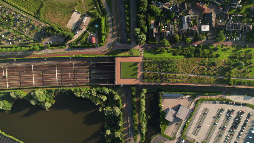 Top View Of Barendrecht Railway Station On Sunny Day In South Holland, Netherlands. aerial shot