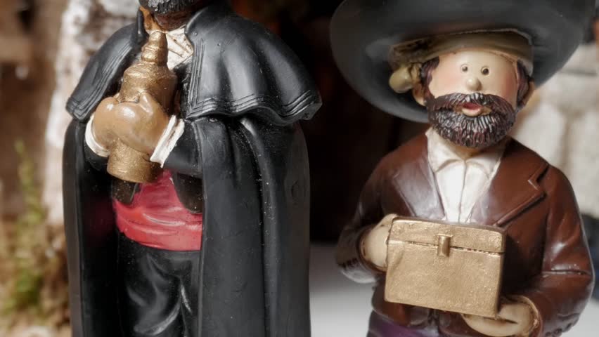 Close-up footage showcases the three kings, or Magos Reyes, as they carry gifts for baby Jesus in the nativity scene. The entire scene beautifully depicts the festive tradition.