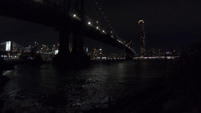 Manhattan bridge at night seen from Brooklyn. New York City, USA