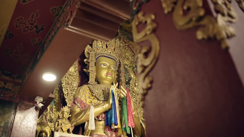 Kathmandu Gold Buddha Statue in Nepal at Boudhanath Stupa, Big Buddhist Buddha at a Buddhist Temple Decorated with Gold Leaf at a Popular Buddhist Religious Temple Site and Tourist Attraction
