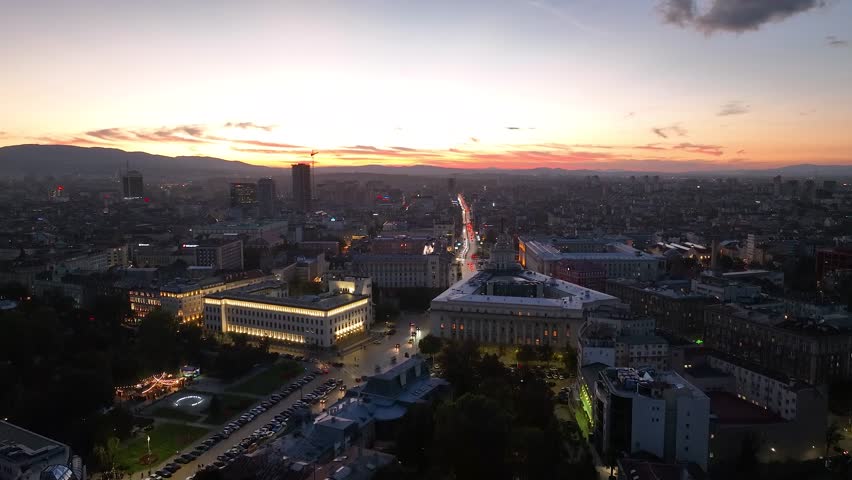 Night aerial view of the capital of Bulgaria, Sofia. Architectural and emblematic buildings from the communist era in the city center. Council of Ministers, Presidency and Party House. Sunset, sunrise