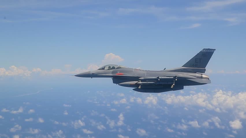 An F-16 Fighting Falcon flies over Eglin Air Force Base, Florida