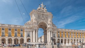 Rua Augusta Arch (Arco da Rua Augusta) timelapse hyperlapse on Praca do Comercio. Historic stone art monument with ornaments and old tourist landmark attraction in Lisbon (Lisboa), Portugal, Europe. - Powered by Shutterstock - Get 15% off with code: PIKWIZARD15