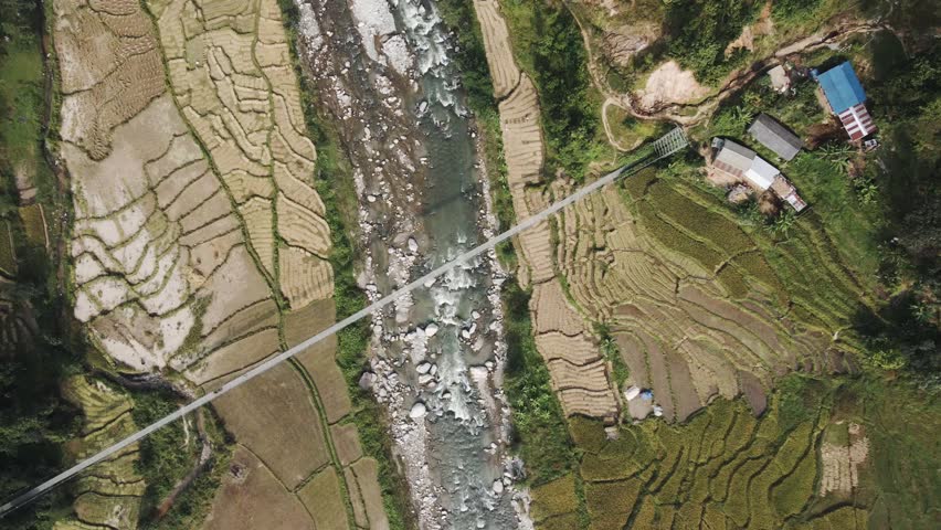 aerial view of river and paddy farmland in Nuwakot, Nepal.