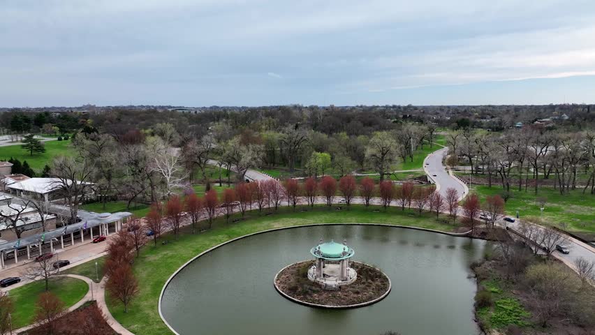 Drone view of pond and monument in a park in St Louis, Missouri